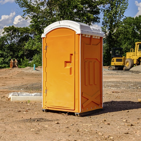 how often are the porta potties cleaned and serviced during a rental period in Portage Lakes